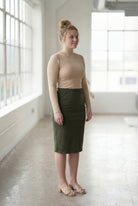 Model wearing Nuggles®  27" Classic Skirt in Olive Green

