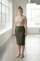 Model wearing Nuggles®  27" Classic Skirt in Olive Green
