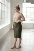 Model wearing Nuggles®  27" Classic Skirt in Olive Green
