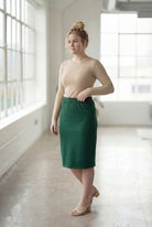 Model wearing Nuggles®  27" Classic Skirt in Pine Green
