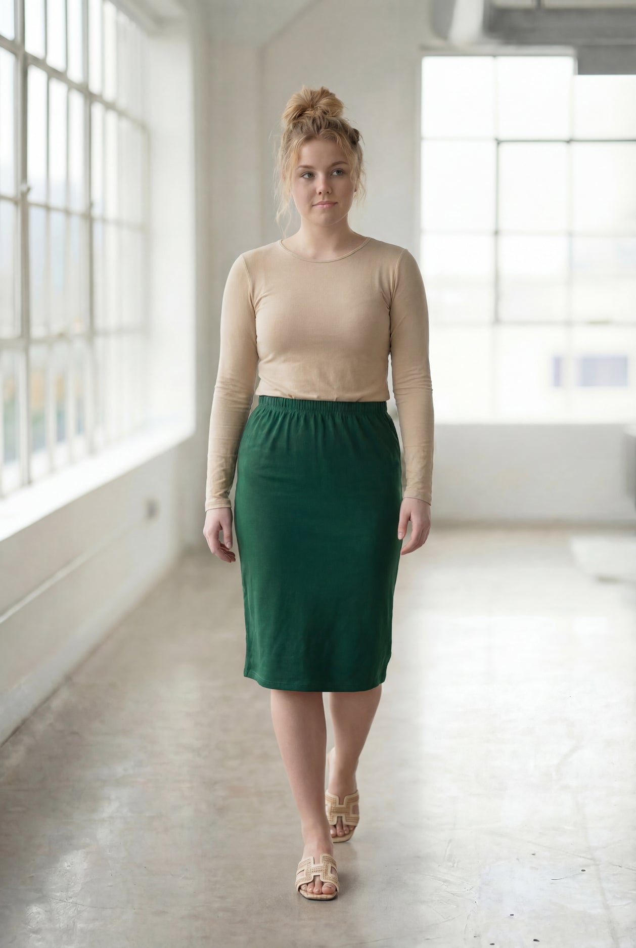 Model wearing Nuggles®  27" Classic Skirt in Pine Green
