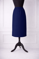Stock photo of our Nuggles® 27-inch classic skirt elastic waistband and straight silhouette in Dark Royal