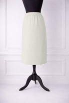 Stock photo of our Nuggles® 27-inch classic skirt elastic waistband and straight silhouette in Off White