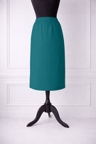 Stock photo of our Nuggles® 27-inch classic skirt elastic waistband and straight silhouette in Teal