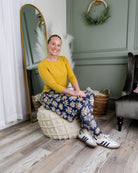 Model wearing Nuggles® Tilly Sport Skirt in Daisy After Dark