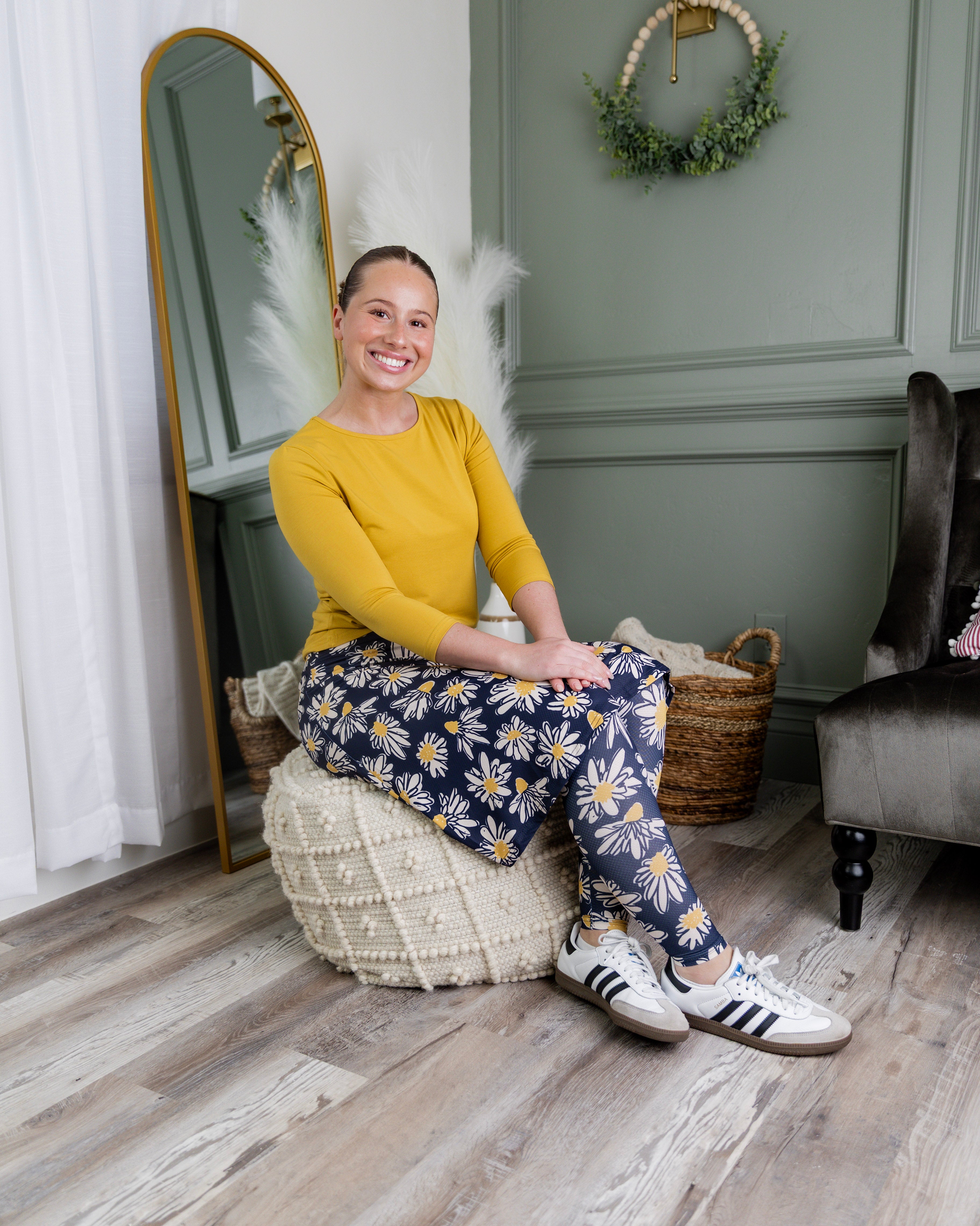 Model wearing Nuggles® Tilly Sport Skirt in Daisy After Dark