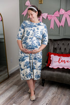 Model wearing Nuggles® Nalani Nursing Dress in Bluebell Toile