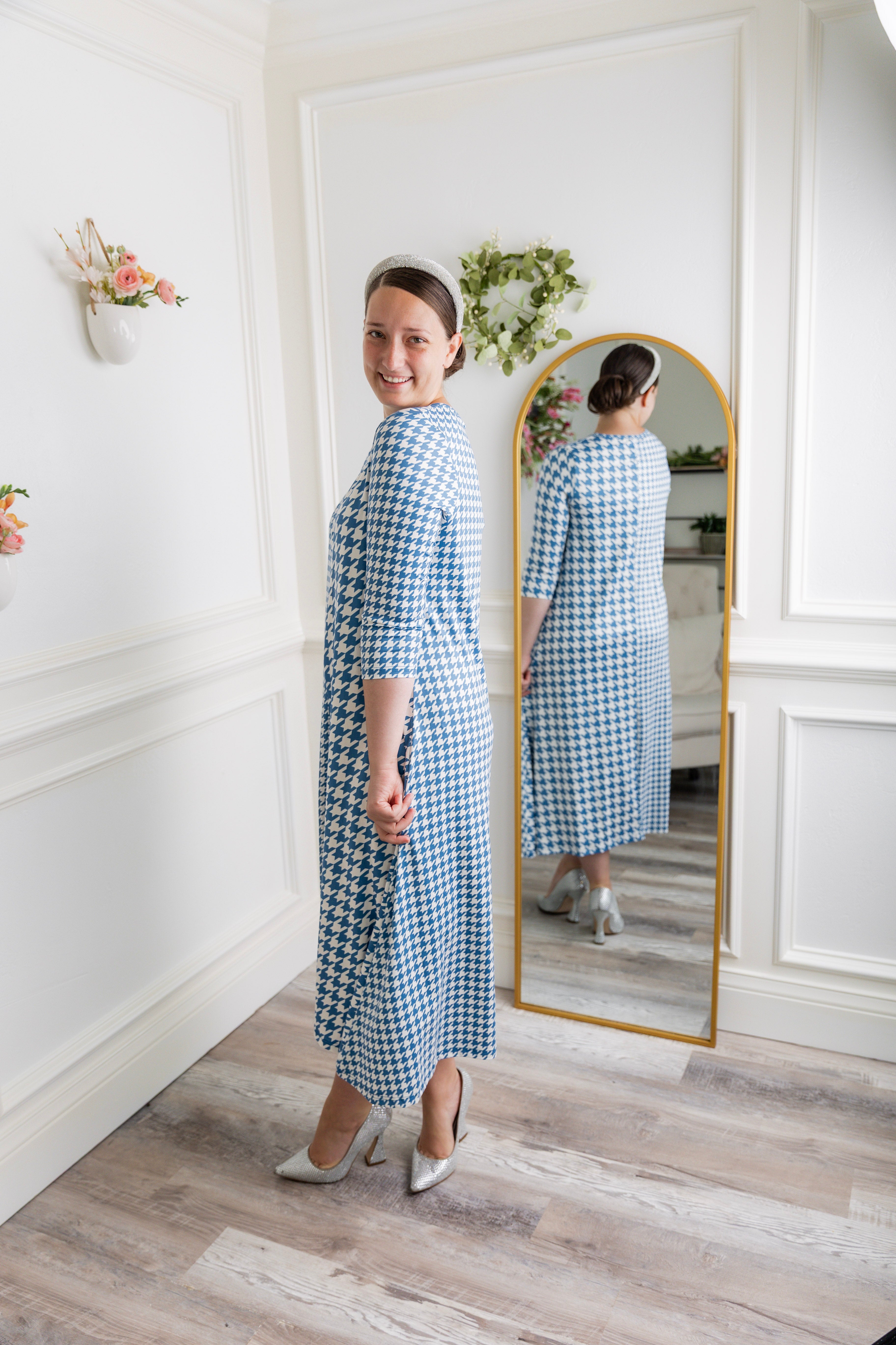 Model wearing the Nuggles® Liana Dress – modest midi dress with ¾ sleeves