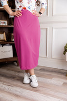 Model wearing Nuggles® 31" All-Sport Skirt in Hot Pink