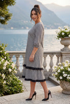 Model wearing Nuggles® Patricia Dress in Peppergrid