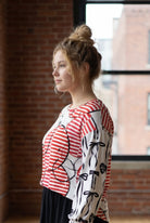 Model wearing the Nuggles® Bryauna Top in Boardwalk Bows