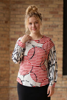 Model wearing the Nuggles® Bryauna Top in Boardwalk Bows