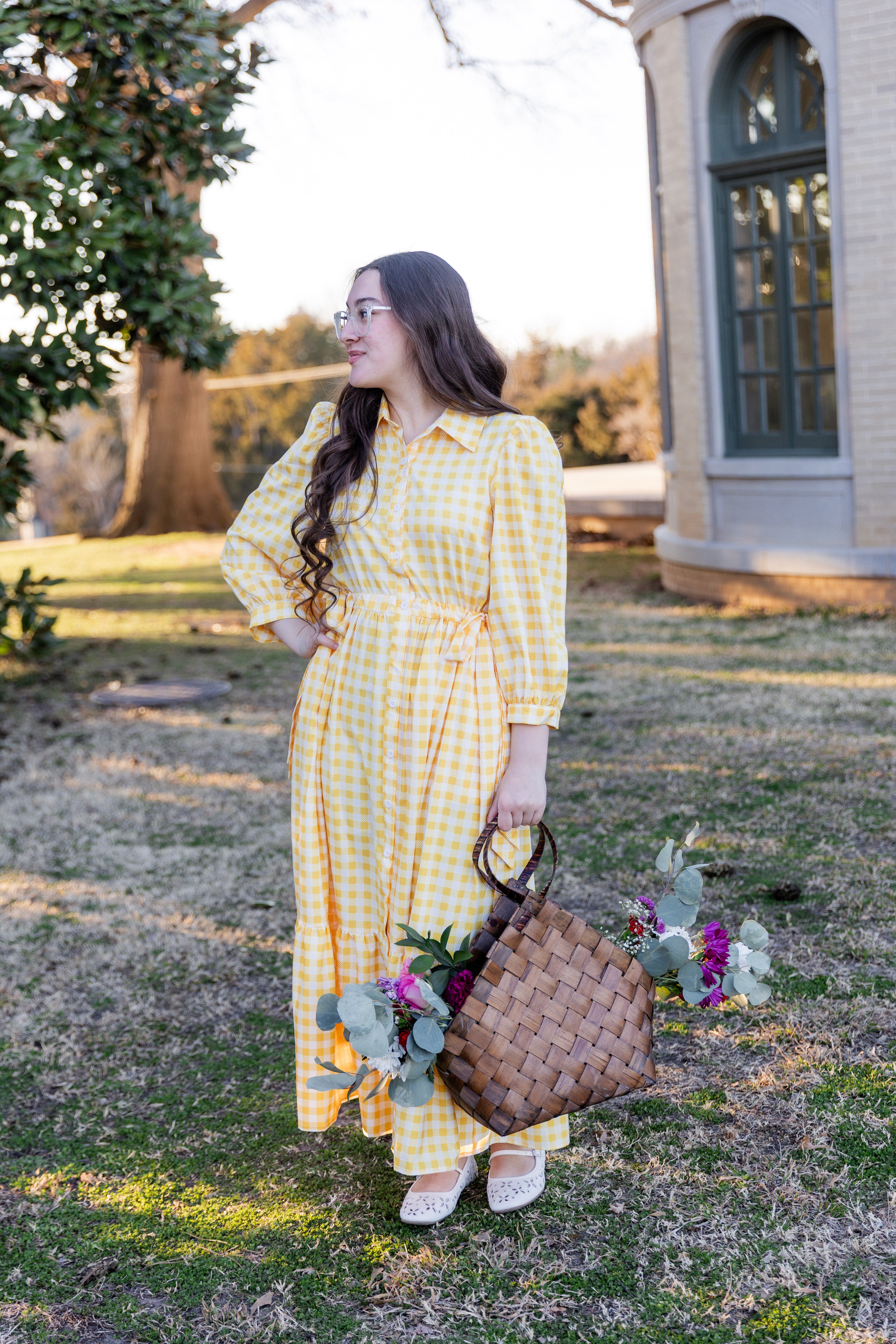 Model wearing the Nuggles® Leila Dress in Sunshine Check