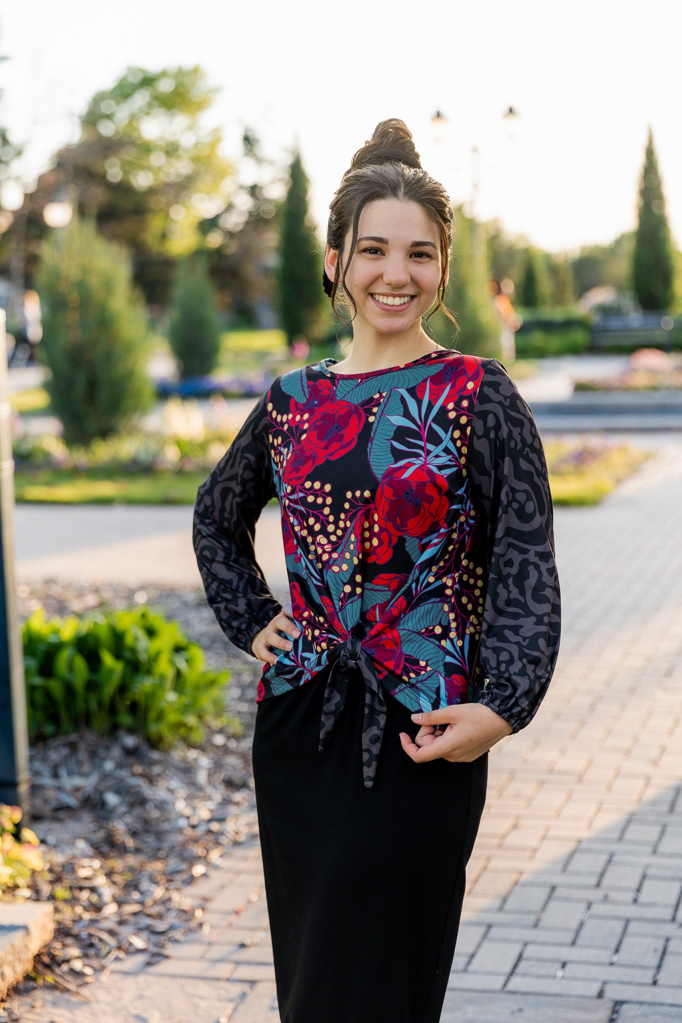 modest long sleeve top with a tie knot and contrasting knit fabrics