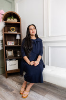 Model wearing Nuggles® 31' Eleanor Skirt in Navy