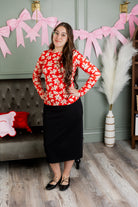 Model wearing Nuggles® Essential Long Sleeve Tee in Red Petal Party