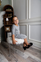 Model wearing our Nuggles® girls midi layering dress