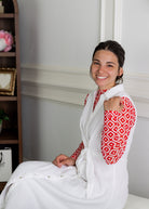 Model wearing Nuggles® Mesh Tee in Candy Apple Geo