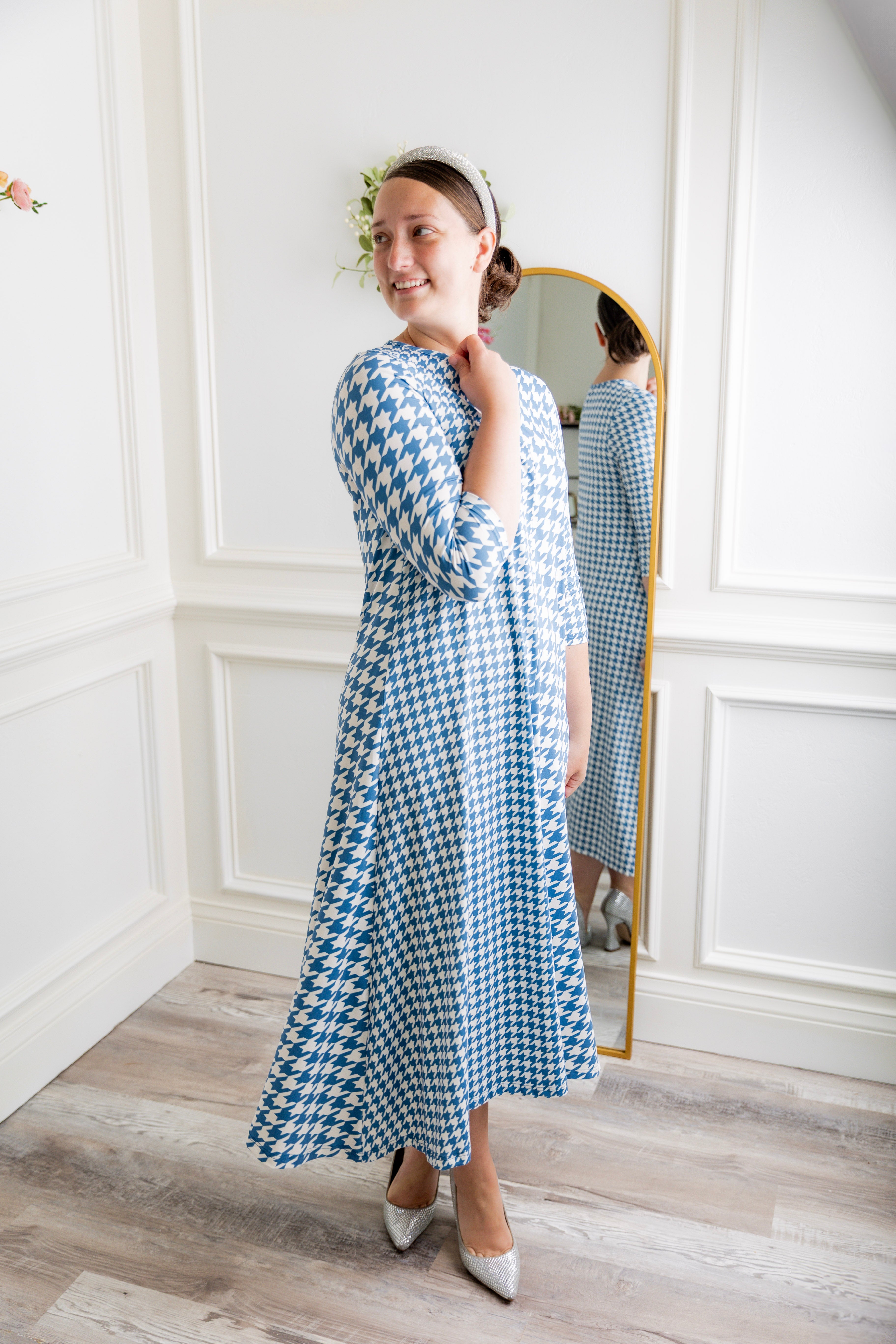 Model wearing the Nuggles® Liana Dress – modest midi dress with ¾ sleeves