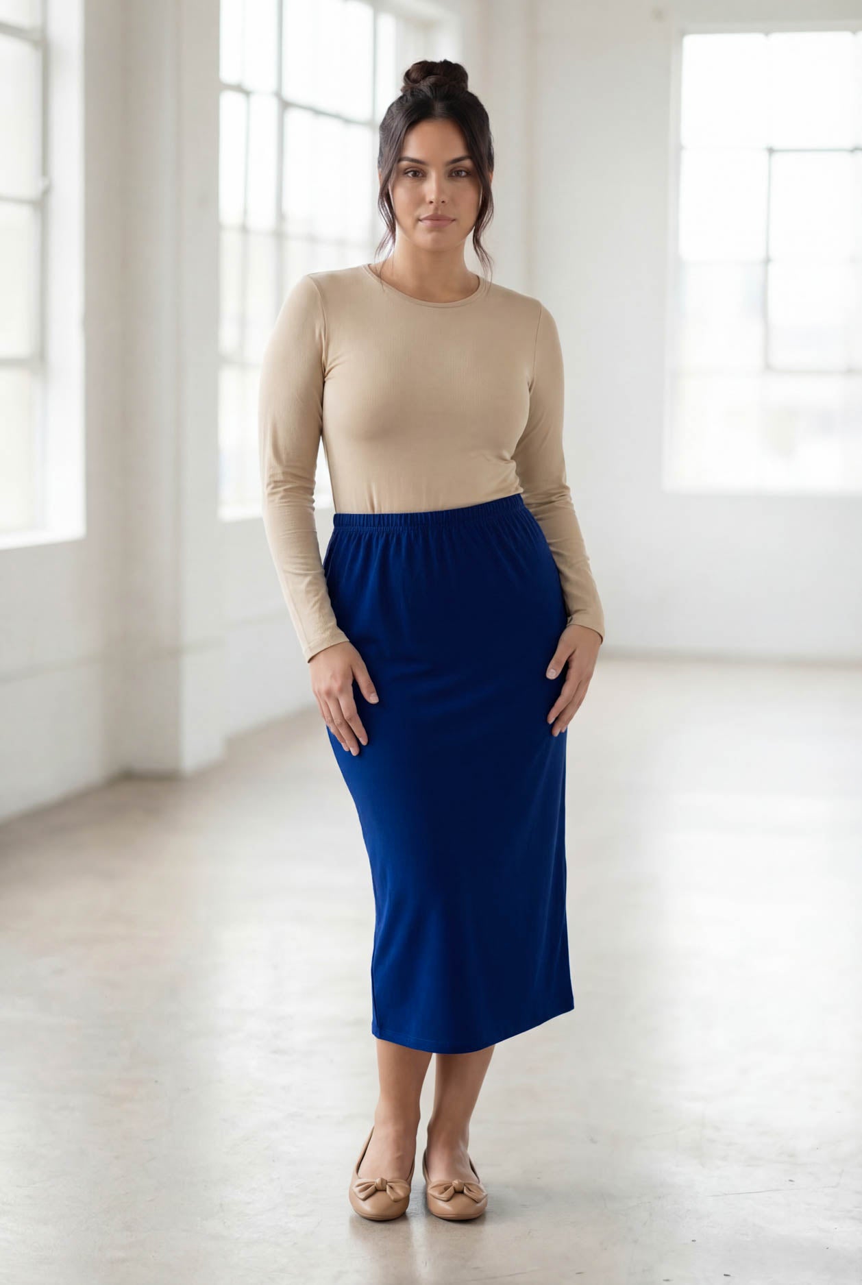 Model wearing Nuggles® 31" Classic Skirt in Dark Royal