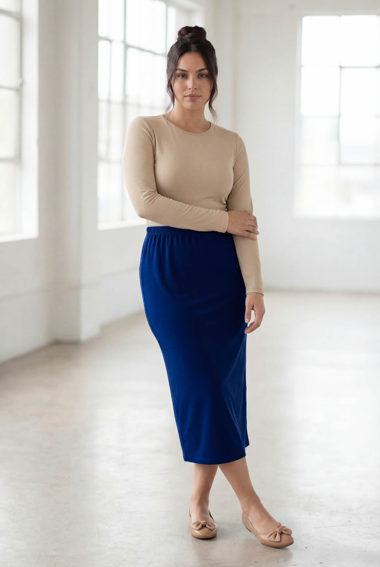 Model wearing Nuggles® 31" Classic Skirt in Dark Royal
