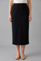 Model wearing Nuggles® 31" Pocket Classic Skirt in Black