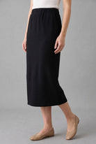 Model wearing Nuggles® 31" Pocket Classic Skirt in Black