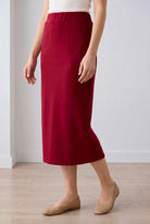 Model wearing Nuggles® 31" Pocket Classic Skirt in Dark Brick