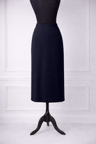 Model wearing Nuggles® 31" Relaxed Skirt in Navy