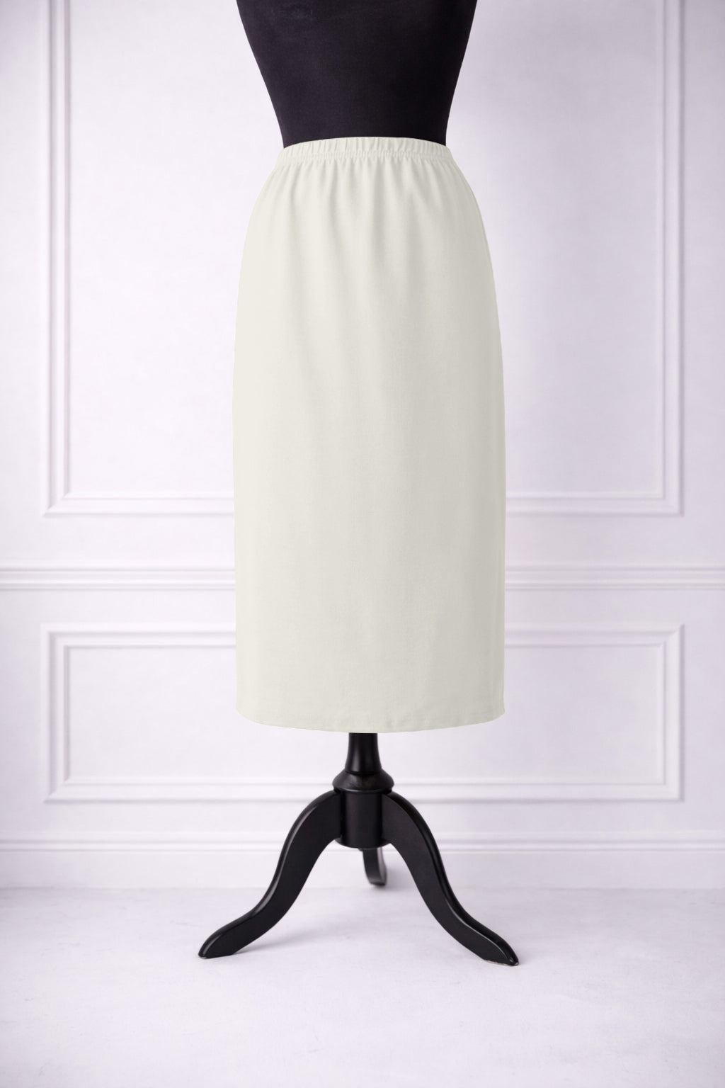 Stock photo of our Nuggles® 31-inch classic skirt elastic waistband and straight silhouette in Off White