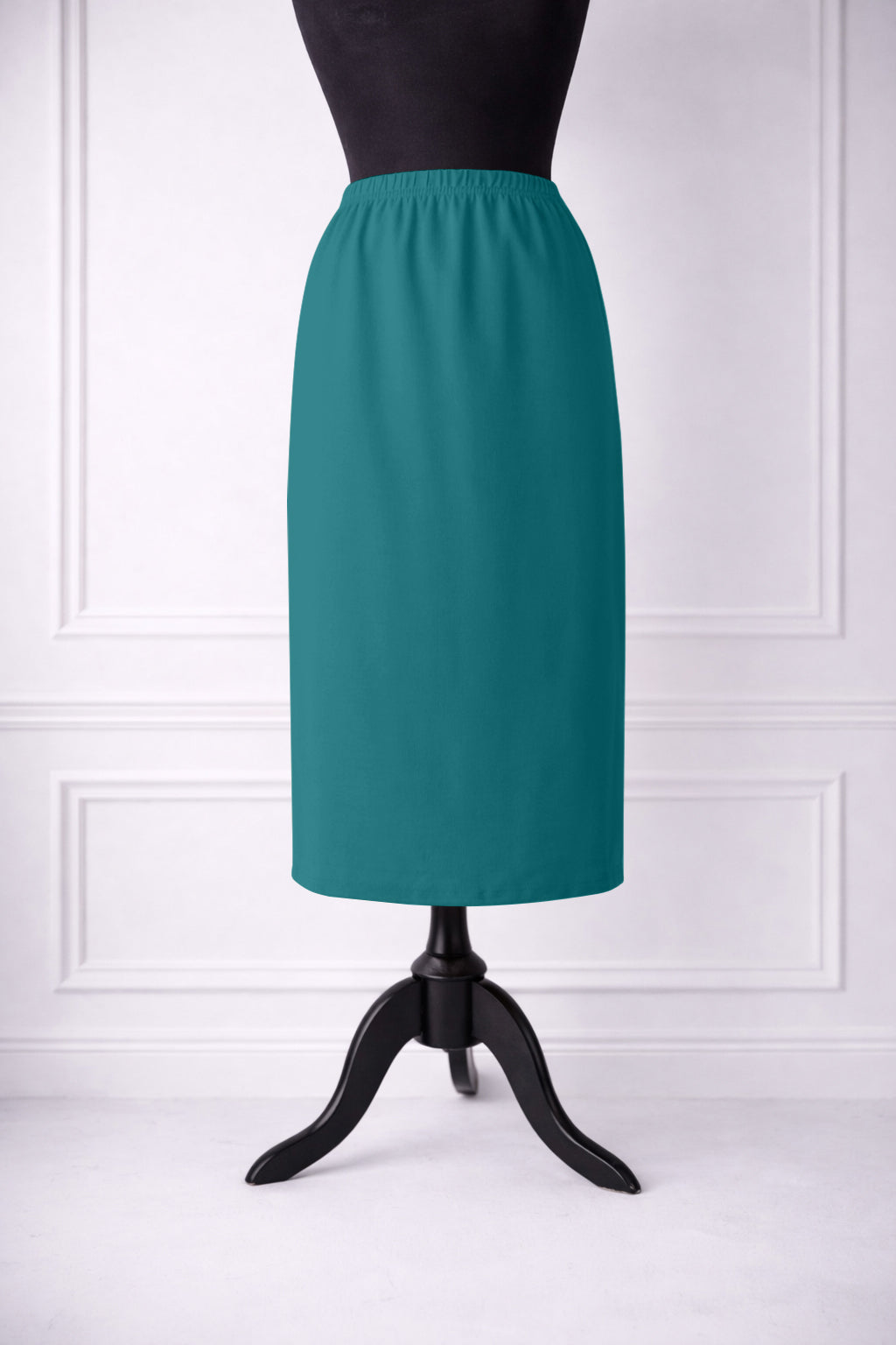 Stock photo of our Nuggles® 31-inch classic skirt elastic waistband and straight silhouette in Teal