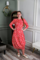 Model wearing Nuggles® Cindy Bubble Dress in Berry Maze