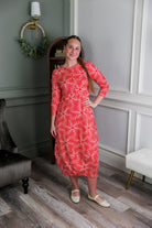 Model wearing Nuggles® Cindy Bubble Dress in Berry Maze