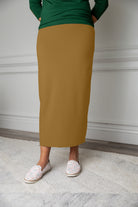 Nuggles® modest midi skirt in [color/print] – soft knit, no-iron, available in 27", 31", 34" lengths.