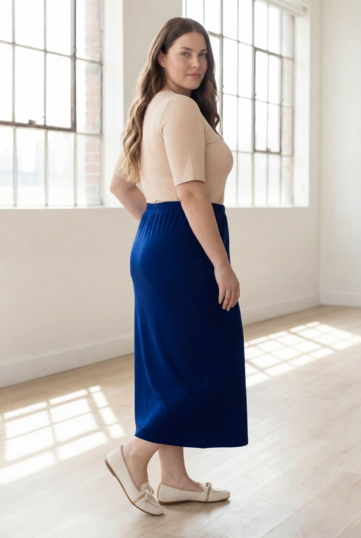 Model wearing Nuggles® 34" Classic Skirt in Dark Royal