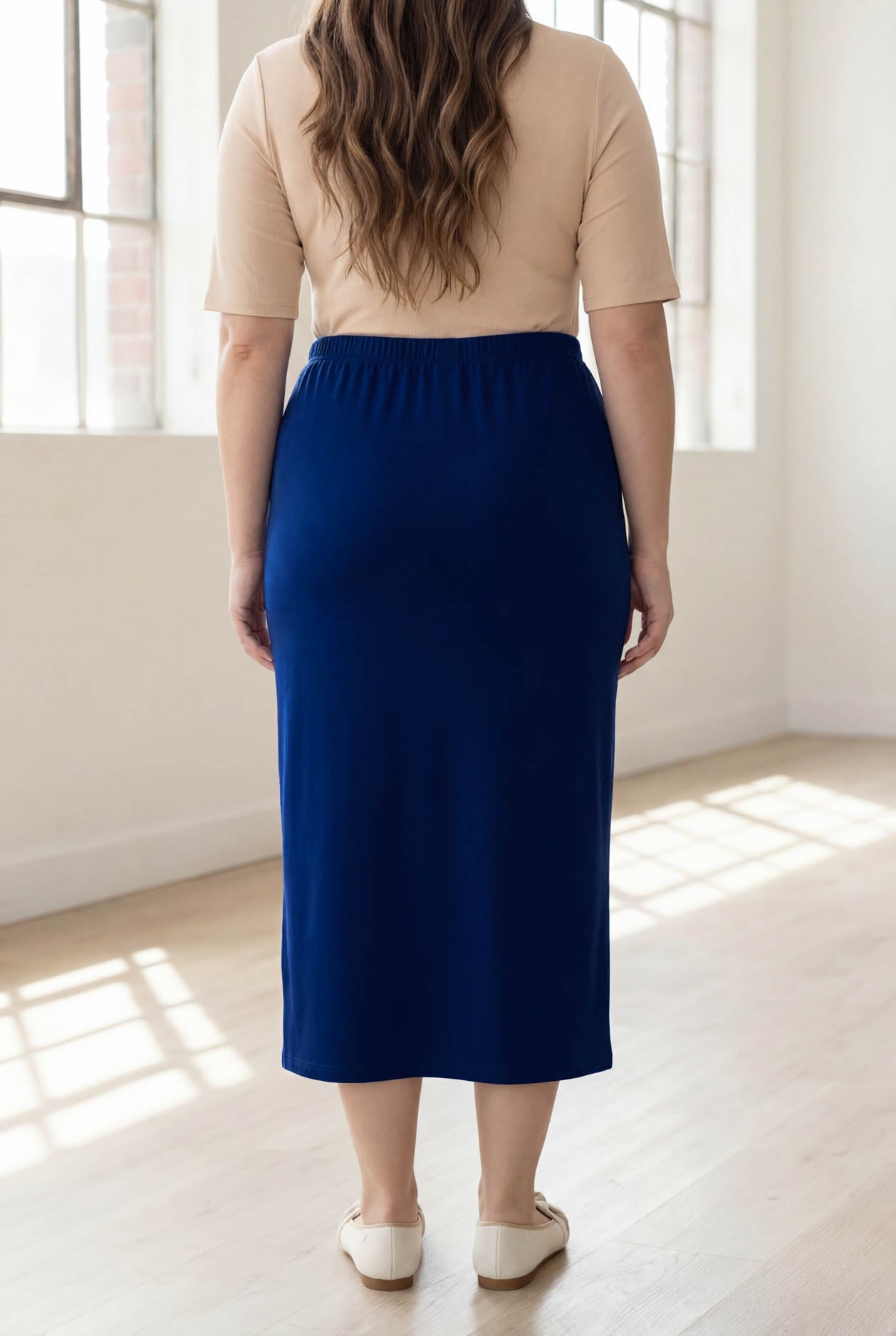 Model wearing Nuggles® 34" Classic Skirt in Dark Royal