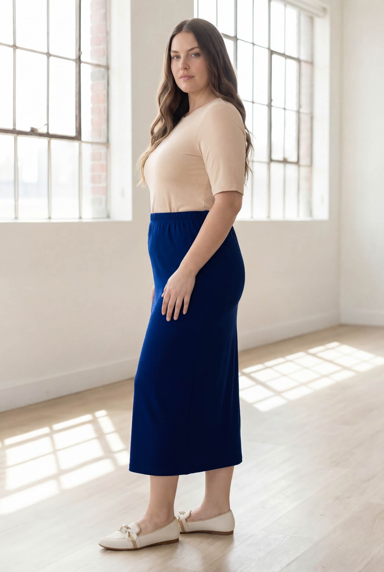 Model wearing Nuggles® 34" Classic Skirt in Dark Royal