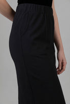 Model wearing Nuggles® 34" Pocket Classic Skirt in Black