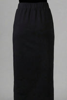 Model wearing Nuggles® 34" Pocket Classic Skirt in Black