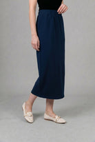Model wearing Nuggles® 34" Pocket Classic Skirt in Dark Navy