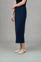Model wearing Nuggles® 34" Pocket Classic Skirt in Dark Navy