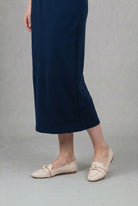 Model wearing Nuggles® 34" Pocket Classic Skirt in Dark Navy