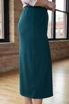 Model wearing Nuggles® 34" Classic Skirt  in Teal Green