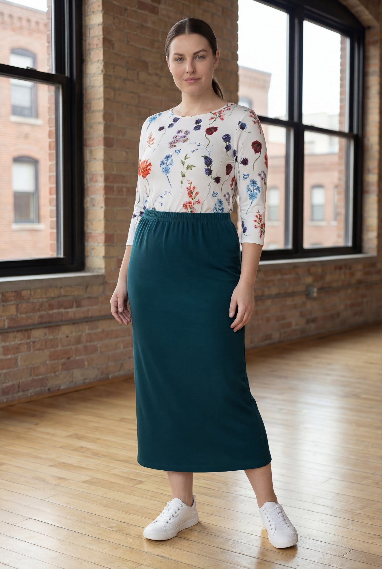 Model wearing Nuggles® 34" Classic Skirt  in Teal Green