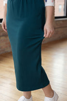 Model wearing Nuggles® 34" Classic Skirt  in Teal Green