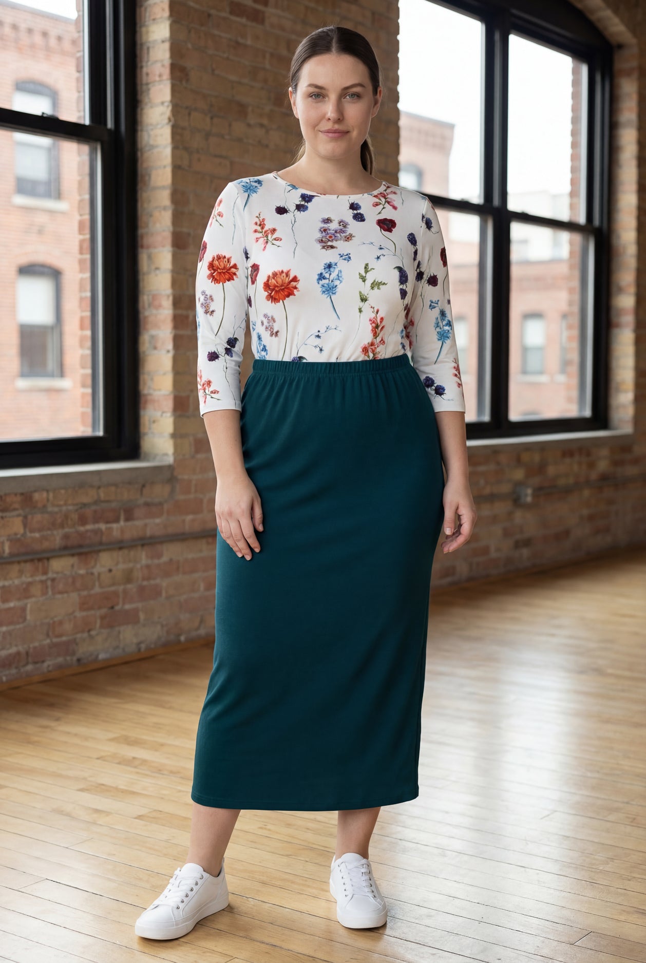 Model wearing Nuggles® 34" Classic Skirt  in Teal Green
