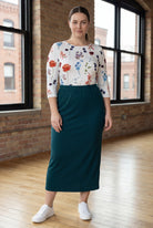 Model wearing Nuggles® 34" Classic Skirt  in Teal Green