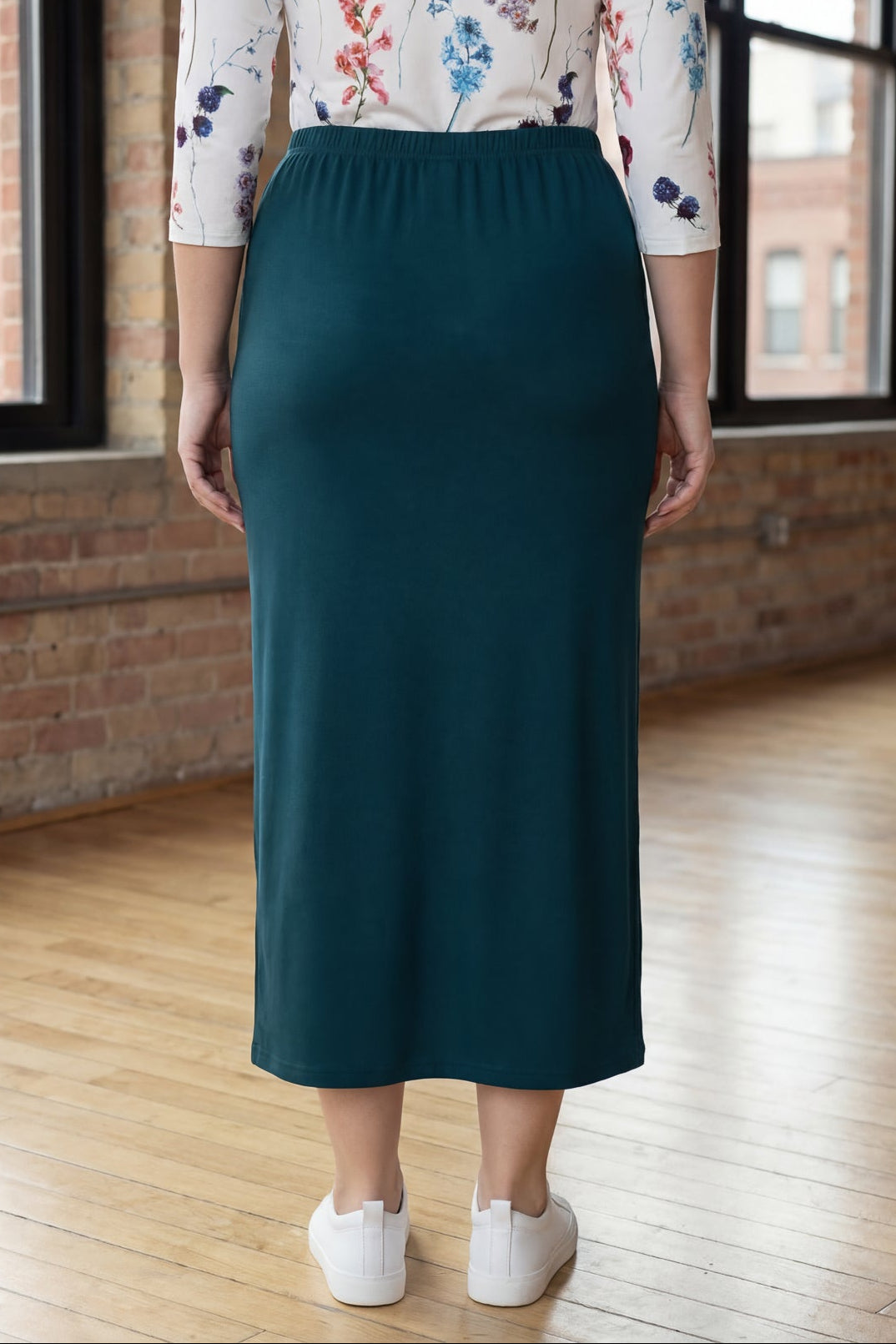 Model wearing Nuggles® 34" Classic Skirt  in Teal Green