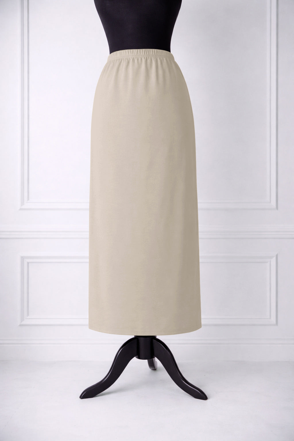 Stock photo of our Nuggles® 34-inch classic skirt elastic waistband and straight silhouette in Nude