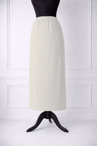 Stock photo of our Nuggles® 34-inch classic skirt elastic waistband and straight silhouette in Off White